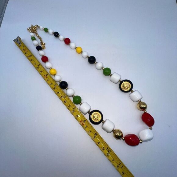 Liz Claiborne Beaded Bib Necklace Gold Tone Multicolor Long Nautical  Crest - Picture 5 of 6